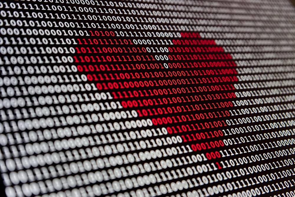 Heart made out of 1s and 0s indicating that medical tech is a growing industry
